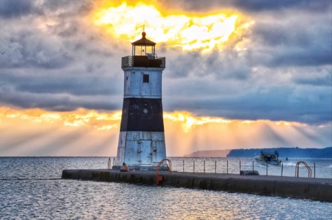 North Pier bright sun clouds